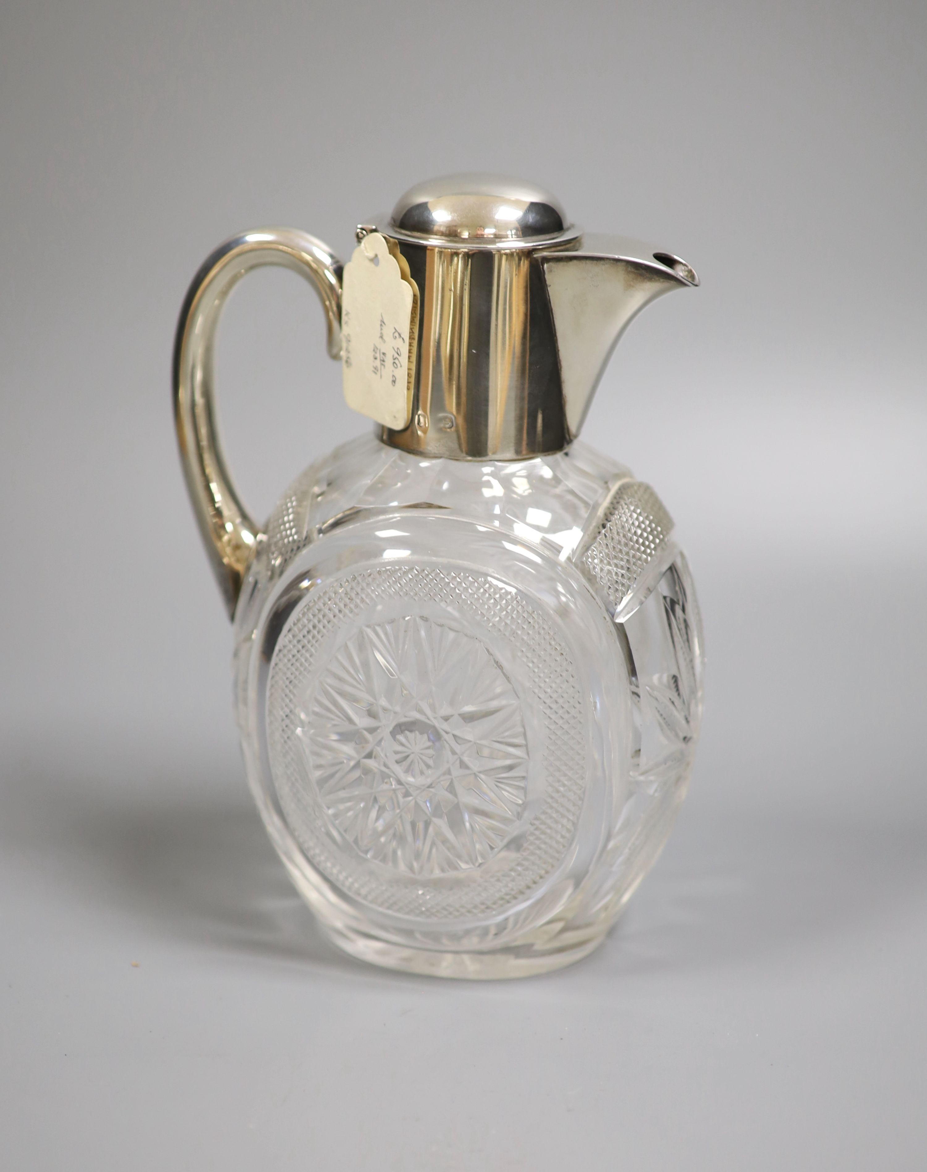 A late Victorian silver mounted cut glass claret jug, Hukin & Heath, Birmingham, 1898, 20.4cm.